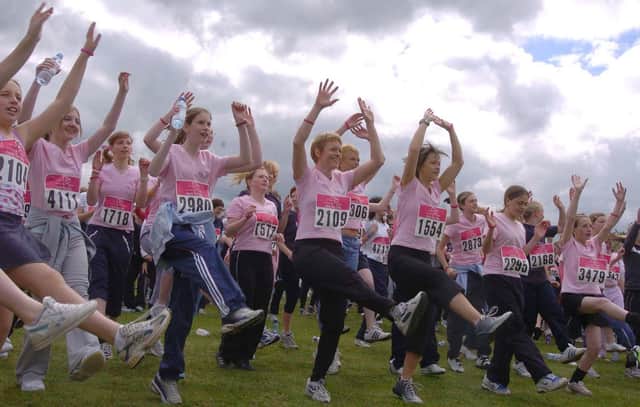 A pre-run warm-up session for the Race for Life at Don Valley Bowl in May 2005