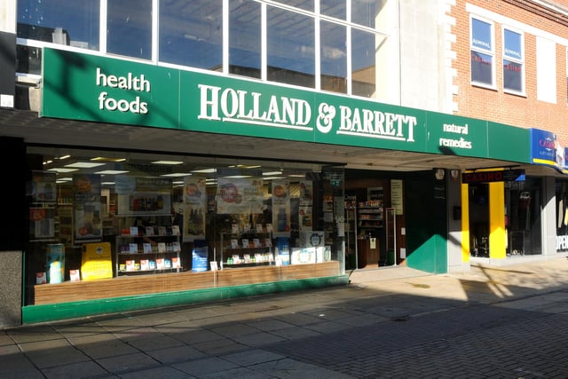Holland & Barrett in Commercial Road, Portsmouth is open during the lockdown. Picture: Sarah Standing (051120-7694)