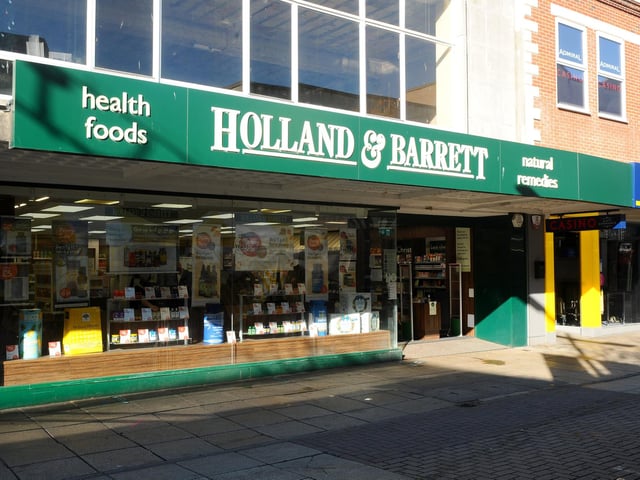 Holland & Barrett in Commercial Road, Portsmouth is open during the lockdown. Picture: Sarah Standing (051120-7694)