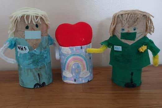 NHS workers feature in this model with a message of love