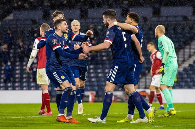 Scotland players celebrate after Grant Hanley makes it 1-1 against Austria. (Photo by Craig Williamson / SNS Group)
