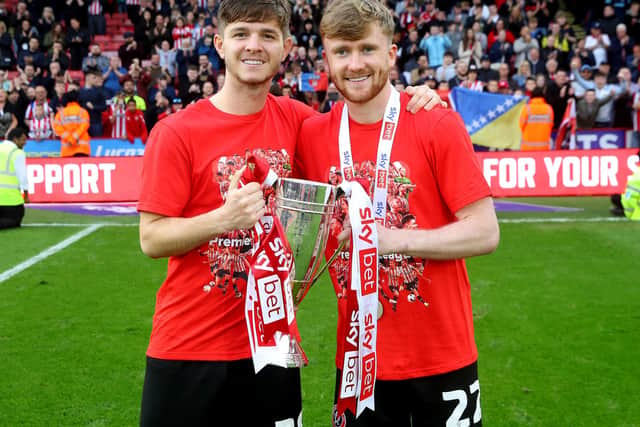 James McAtee and Tommy Doyle celebrate promotion with Sheffield United: Simon Bellis / Sportimage