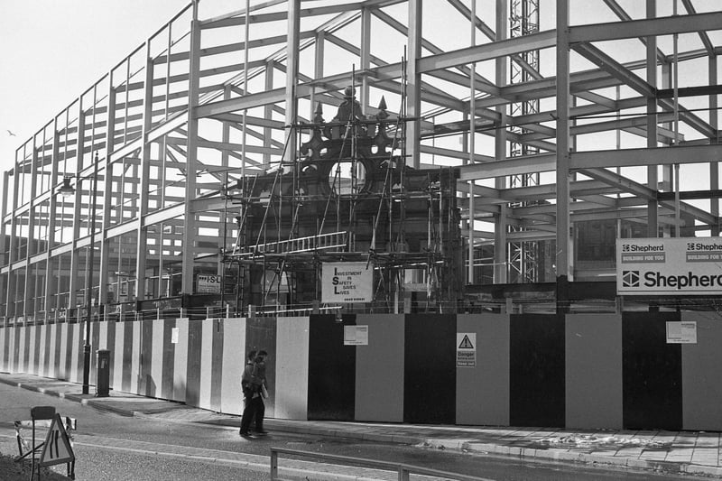 The ornate facade of the old High Street swimming baths were dwarfed by the steel framework of the new Inland Revenue office in Sunderland in this scene from February 1991.