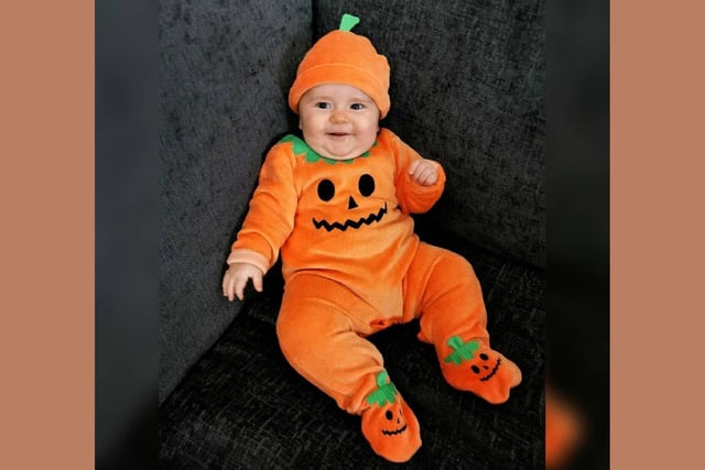 Violet was anything but, thanks to her orange pumpkin costume!
