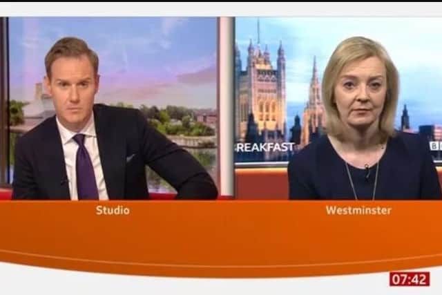 Sheffield's Dan Walker 'blindsided' foreign secretary Liz Truss on BBC Breakfast today with a 2019 photo of her and senior Tories pictured with a major Russian donor. Image by BBC Breakfast.