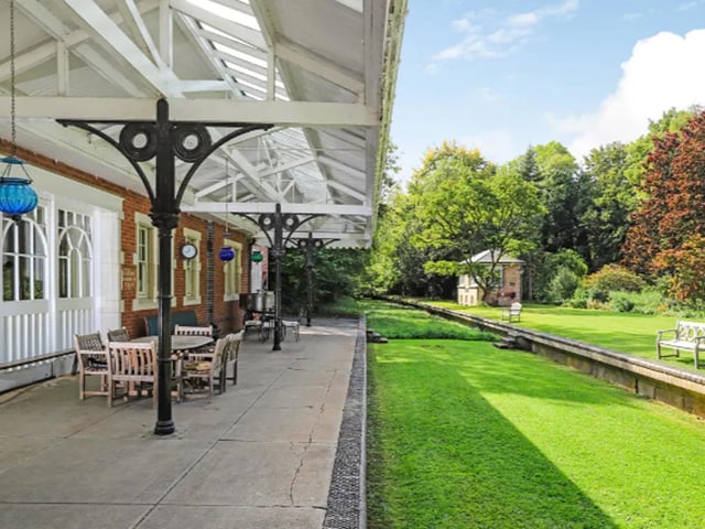 The garden, with a strip of lawn where train tracks once were