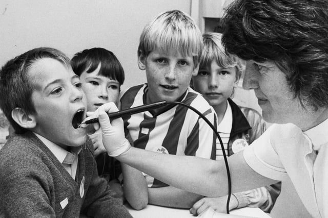 Dentist Penelope Vasey is pictured with third year pupils at St Gregory's, South Shields as she spread the message that there's no need to fear visits to the dentist. Remember this from 1990?