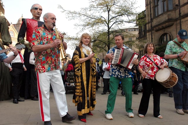 Sheffield's 2006-7 Lord Mayor Coun Jackie Drayton with musicians outside the town hall, watching dancers celebrate St George's Day