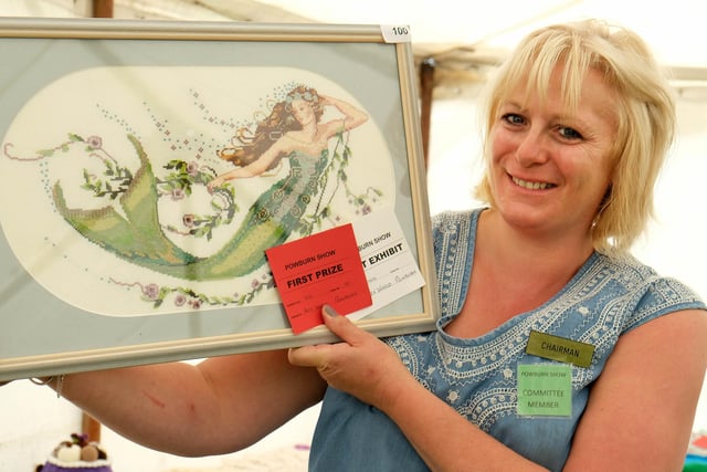 New show chair Bev Wood was on winning form, winning best exhibit with her embroidery.