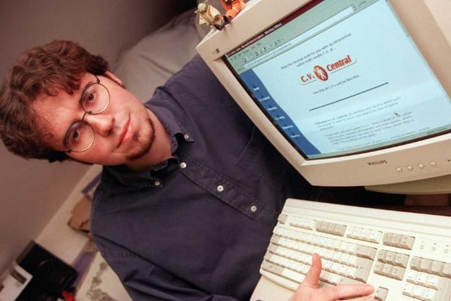 Andrew Kaye, from Scawsby, showing off his new website. 1999.