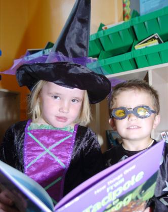Rebecca Bullman aged five dressed as a Witch and Ryan Hooks aged six dressed as Harry Potter. 2007 Highfields Primary School.