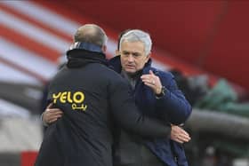 Tottenham Hotspur manager Jose Mourinho, and Sheffield United manager Chris Wilder embrace after Sunday's Premier League match at Bramall Lane: Mike Egerton/Pool via AP