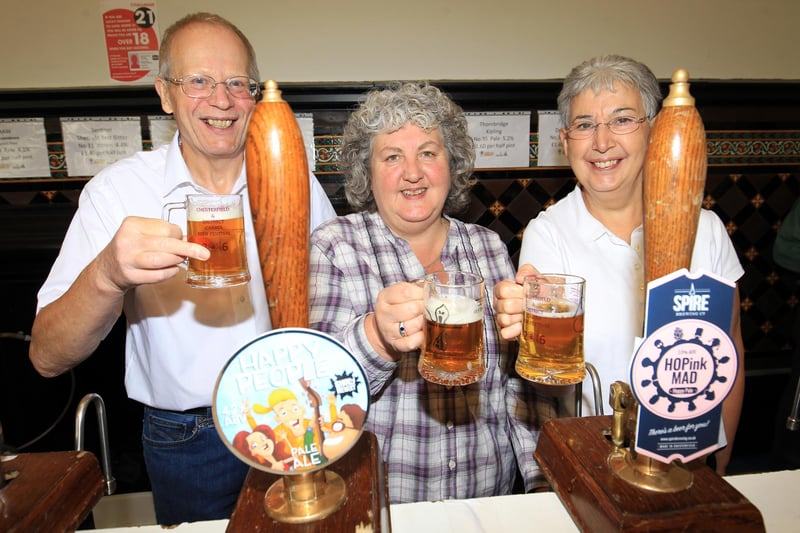 Mick Portman, Jane Lefley, and Janet Portman at the Chesterfield & District CAMRA Beer Festival in the Market Hall Assembly Rooms.