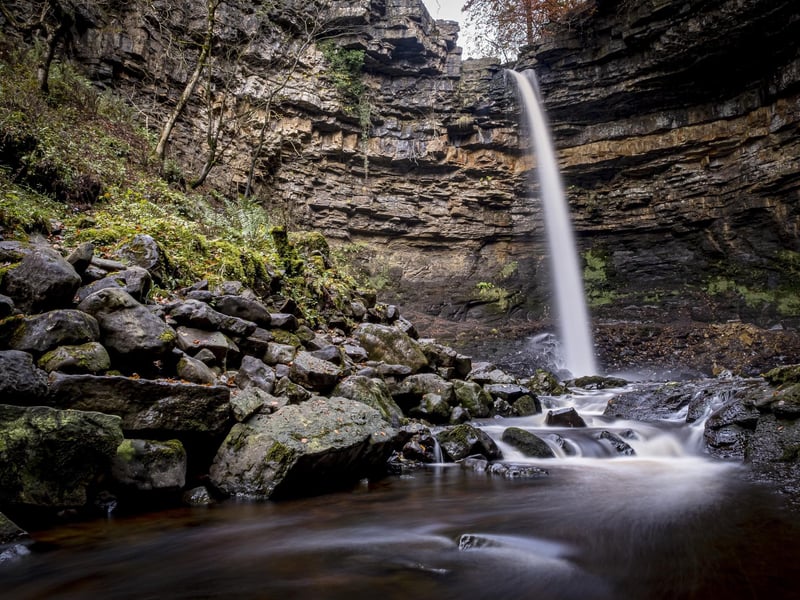 Tucked away behind a historic country pub, this is England's highest single-drop waterfall. The water plummets 100 feet into a natural amphitheatre, creating a hidden, out-of-this-world atmosphere that feels like a secret garden.