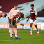 BIRMINGHAM, ENGLAND - SEPTEMBER 21: John Lundstram of Sheffield United and Sander Berge of Sheffield United react after   the Premier League match between Aston Villa and Sheffield United at Villa Park on September 21, 2020 in Birmingham, England. (Photo by Tim Goode - Pool/Getty Images)