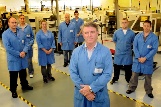 Infoteam factory manager Kevin Hodgson, centre, and staff at their Bede Industrial Estate factory seven years ago.