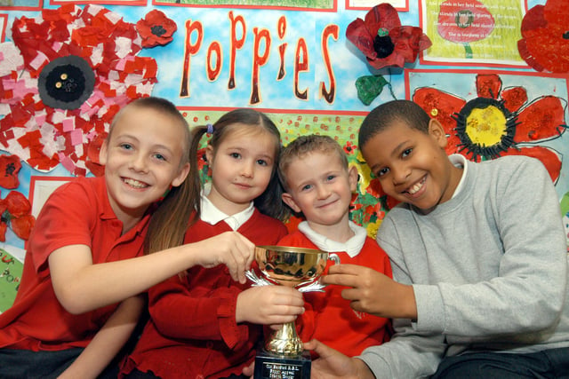 2007:  Pupils of Hempshill Hall School with their RBL Poppy Appeal trophy. From the left are James Palmer, Liberty Sharp, Ethan Grainger and Blain Lyndon