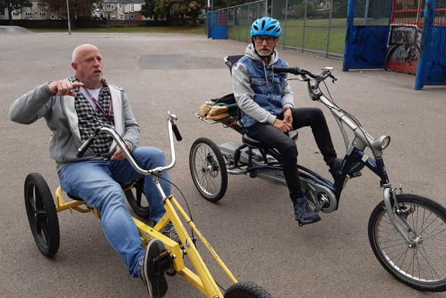 Vincent O’Neill of support service Home Instead, left, and his client George Morton enjoying one of their regular session with Sheffield Cycling 4 All in Hillsborough Park last year