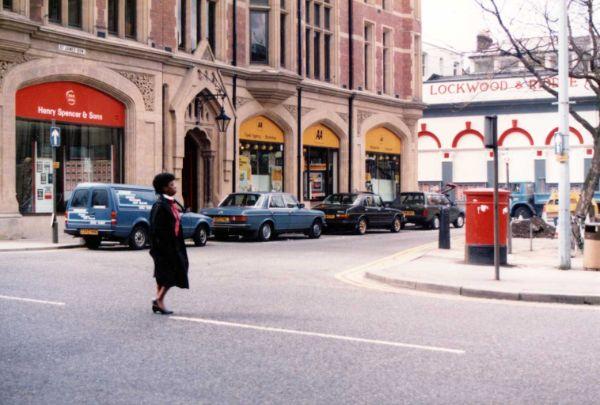 St. James Row from Church Street Henry Spencer and Sons, estate agents; Automobile Association and Eadon Lockwood and Riddle, estate agents, 1986