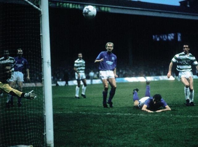 12/11/88 - Terry Butcher headed past England international team-mate Chris Woods at Celtic Park as the home side won 3-1