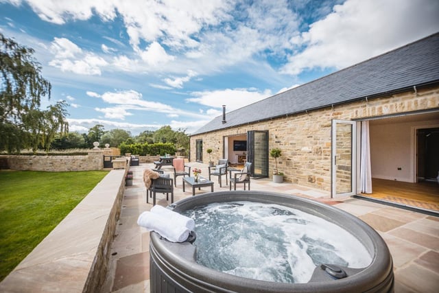 Explore the Dales from this picture perfect two-bedroom holiday cottage. At the end of the day, sink into the outside hot tub in the private garden.