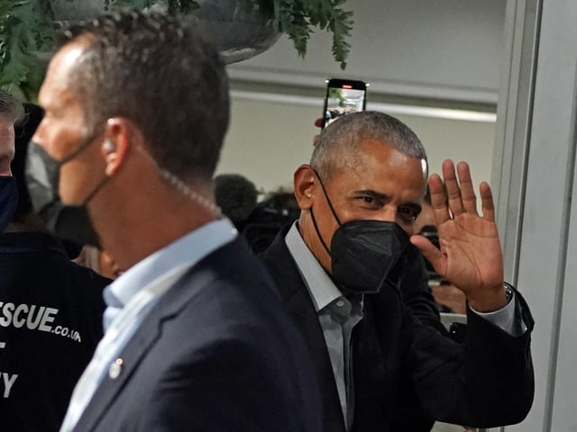 Barack Obama (right) attending the Cop26 summit in Glasgow. Picture date: Monday November 8, 2021.