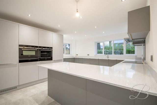 The kitchen is fitted with a stunning range of wall and base units incorporating drainer sink unit.