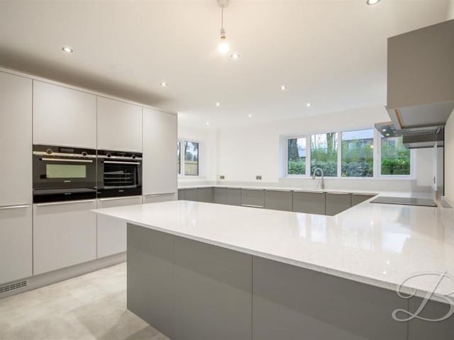 The kitchen is fitted with a stunning range of wall and base units incorporating drainer sink unit.