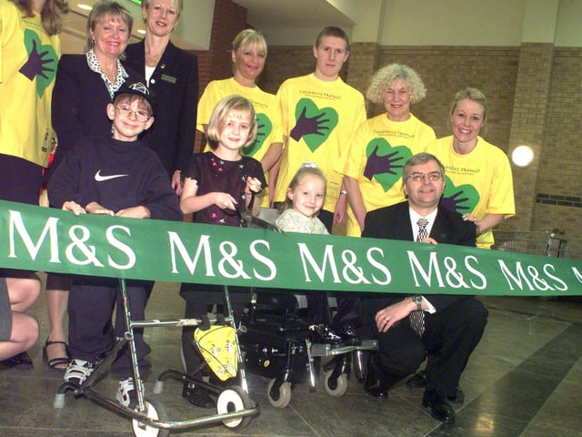 The new look Marks and Spencer, was opened in 1999 by "Children of promise" from left Karl Goddard, Emma Green and Natasha Wilson,with Store Manager Stefan Andrejczuk right