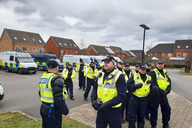 Police in Manvers, Rotherham, where anti-fascism protesters and anti-immigration demonstrators staged rival rallies on Saturday, February 18 near a hotel housing asylum seekers