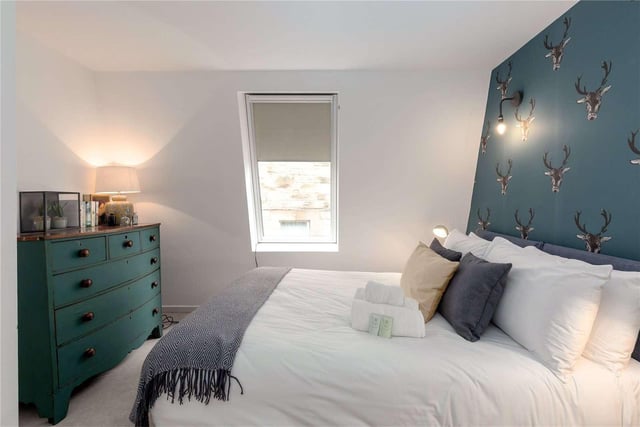 The flat has a double bedroom with a south-west facing window