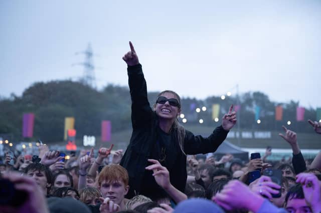 Rock N Roll Circus 2026 - fans enjoy the music despite the weather.