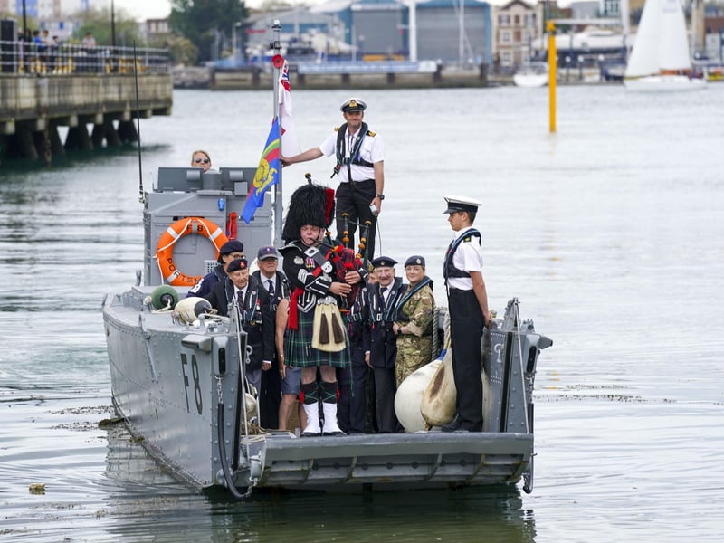 D-Day veterans are welcomed to the Portsmouth Historic Dockyard to commemorate the 77th anniversary of the Normandy Landings. Picture date: Sunday June 6, 2021. Picture: Steve Parsons/PA Wire