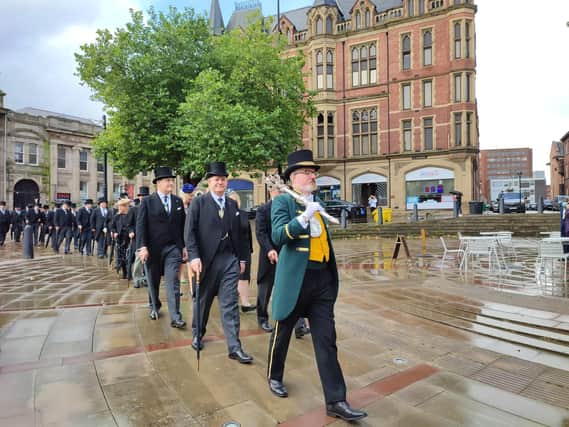 The Beadle leads new Master Cutler James Tear, left, and members of the Company of Cutlers to Sheffield Cathedral.