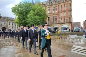 The Beadle leads new Master Cutler James Tear, left, and members of the Company of Cutlers to Sheffield Cathedral.