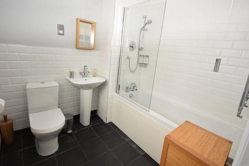 The first bedroom comes with its own modern and smart en suite. Quality fittings include a panelled bath with shower over, low-flush WC, wash basin and central-heated towel-rail.