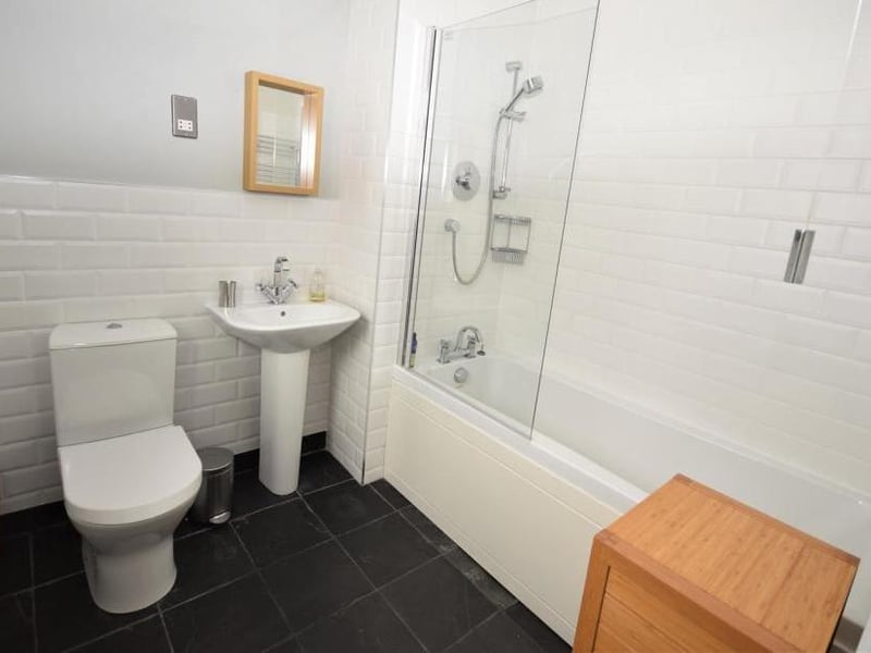 The first bedroom comes with its own modern and smart en suite. Quality fittings include a panelled bath with shower over, low-flush WC, wash basin and central-heated towel-rail.