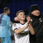 Chris Wilder with Regan Slater after victory at Ipswich: Simon Bellis/Sportimage
