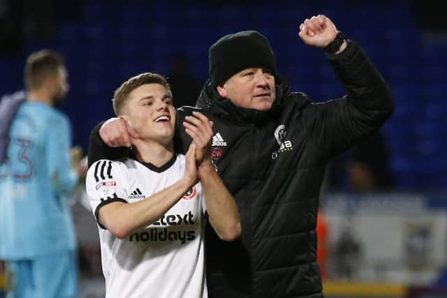 Chris Wilder with Regan Slater after victory at Ipswich: Simon Bellis/Sportimage