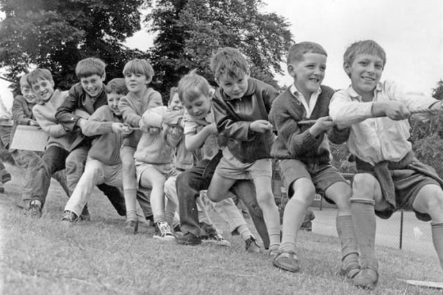 Children take part in a tug of war contest during a summer holiday playscheme at Norfolk Park in Sheffield in 1967