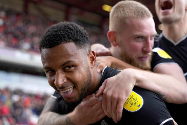 Lys Mousset celebrates one of his two goals in Sheffield United's victory over Barnsley: Andrew Yates / Sportimage
