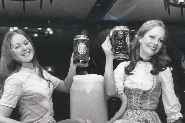 Miss Great Britain, Elizabeth Robinson, left, and Miss Germany, Heidi Webber, right, at the opening of the Hofbrauhaus, in Sheffield, on January 12, 1973