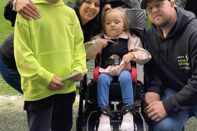 Lillia and her family at a bucket rattle at Hillsborough Stadium. Matt and Emma have raised £3,000 for My Mito Mission since Lillia's diagnosis.