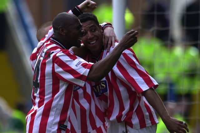 Carl Asaba of Sheffield United is congratulated by Gus Uhlenbeek after scoring the second goal against Wednesday: Ross Kinnaird/ALLSPORT