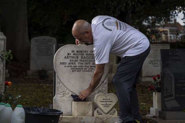 Grave headstone cleaner Steve Haggerty at Handsworh Cemetery. Picture Scott Merrylees