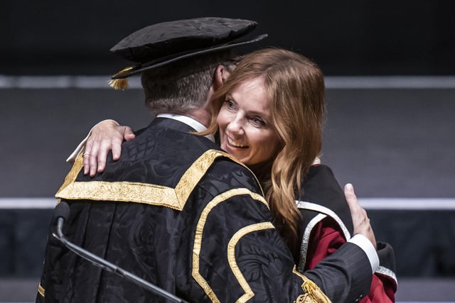Vice Chancellor of Sheffield Hallam University Chris Husbands (left) congratulates Geri Halliwell-Horner (right) after she received an honorary doctorate from Sheffield Hallam University at Ponds Forge International Sports Centre in Sheffield. Picture date: Tuesday November 22, 2022.