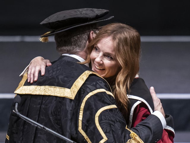 Vice Chancellor of Sheffield Hallam University Chris Husbands (left) congratulates Geri Halliwell-Horner (right) after she received an honorary doctorate from Sheffield Hallam University at Ponds Forge International Sports Centre in Sheffield. Picture date: Tuesday November 22, 2022.