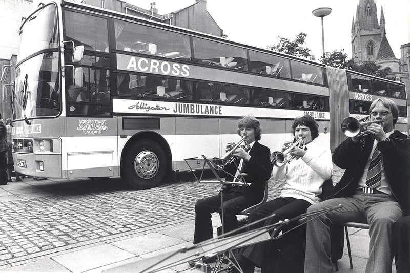 A Jumbulance bendy bus belonging to the Across Trust for taking sick and disabled children on holiday, parked outside the Crucible Theatre for the public to look round, in September 1980. Inside the bus was converted so children could sleep on board.