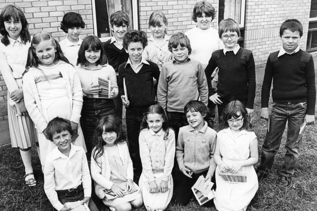 Pupils of Hadrian Junior School received prizes in an art competition sponsored by Hadrian Building Society in 1981. Society's chairman, Gordon Durham presented the awards but can you name the pupils pictured?