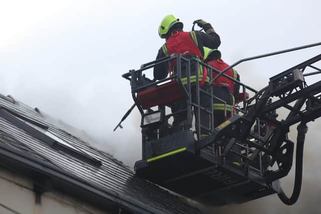 Firefighters tackling the blaze. Picture by SYFR